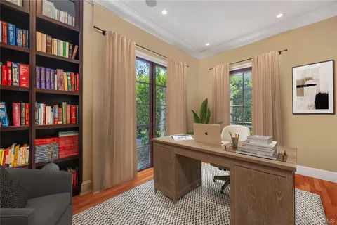a room with furniture and a book shelf