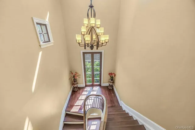 a view of entryway with wooden floor