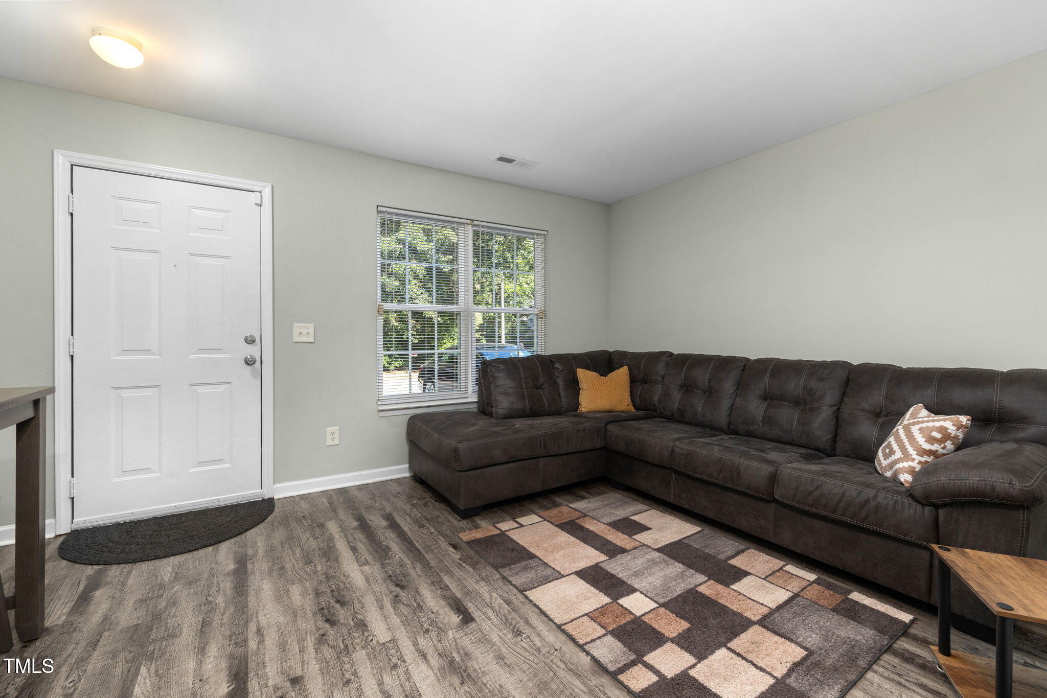 67 Red Lane Raleigh, NC 27606 - Photo 4 of 33 a living room with furniture and a window