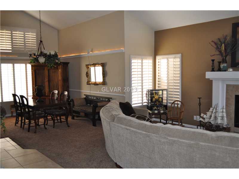 2037 Shadow Brook Way Henderson, NV 89074 - Photo 3 of 34 Entry Hall. VIEW AS YOU WALK IN FRONT DOOR. FORMAL LR ON RIGHT. FORMAL DINING STRAIGHT BACK. (KITCHEN IS TO LEFT OF FORMAL DR)