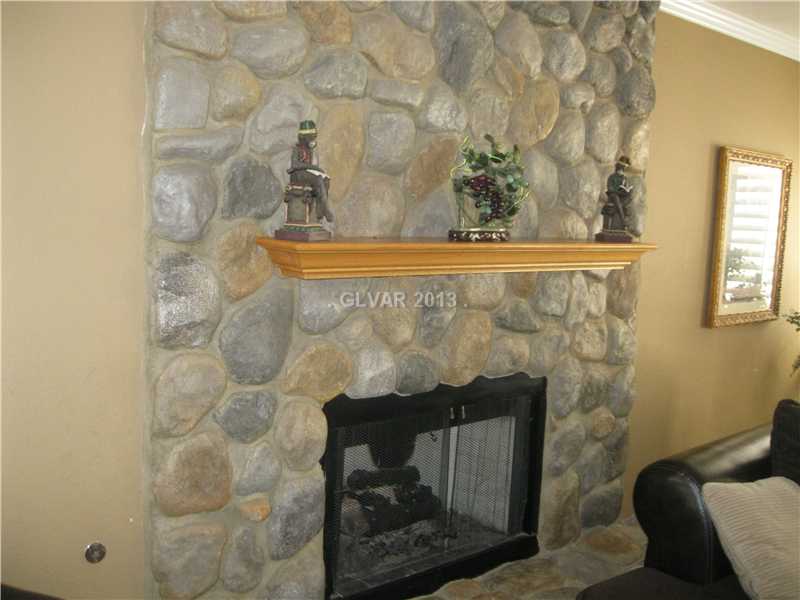 2037 Shadow Brook Way Henderson, NV 89074 - Photo 8 of 34 Den. FIREPLACE IN FAMILY ROOM