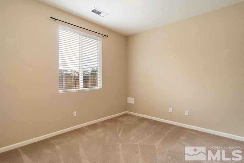 2010 Long Hollow Drive Reno, NV 89521 - Photo 11 of 24 an empty room with a window