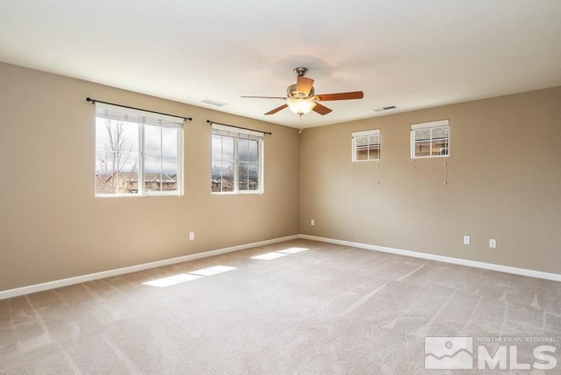 2010 Long Hollow Drive Reno, NV 89521 - Photo 15 of 24 a view of an empty room with a window