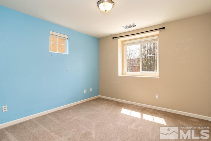 2010 Long Hollow Drive Reno, NV 89521 - Photo 19 of 24 a view of an empty room with a window