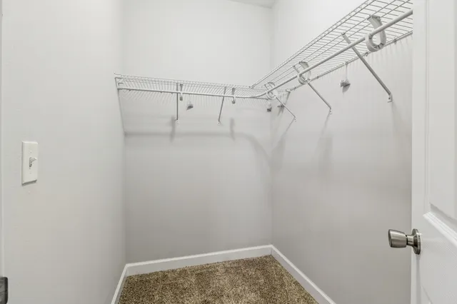a bathroom with a granite countertop sink mirror and double