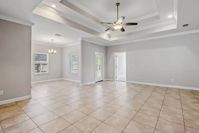 a view of an empty room and window