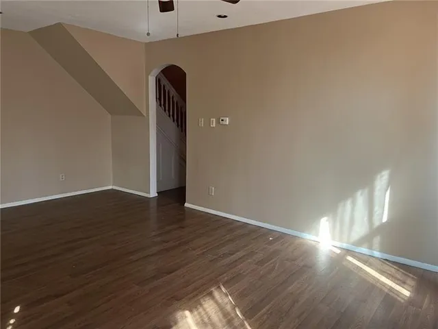 a view of a livingroom with wooden floor