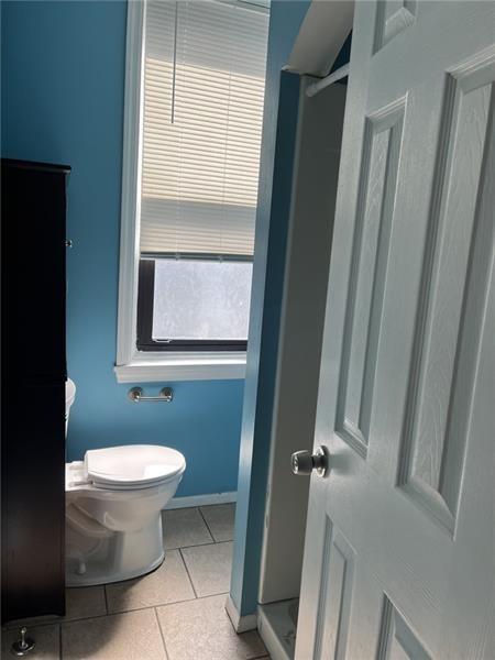 2515 Mt Troy Road Pittsburgh, PA 15212 - Photo 13 of 27 a bathroom with a toilet and a shower