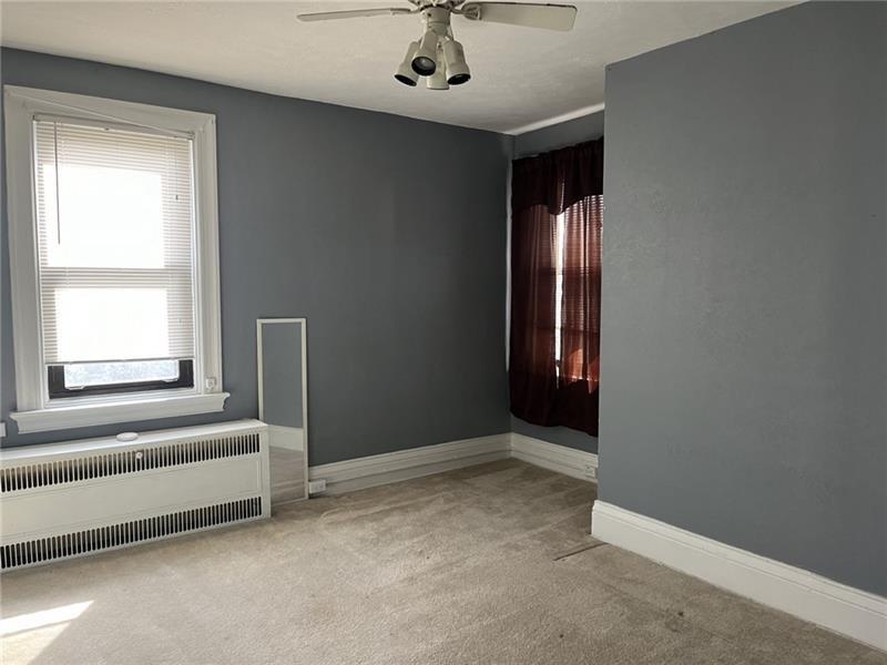 2515 Mt Troy Road Pittsburgh, PA 15212 - Photo 19 of 27 a view of an empty room with a window