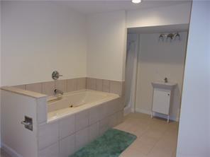 2515 Mt Troy Road Pittsburgh, PA 15212 - Photo 24 of 27 a bathroom with a bathtub and a sink
