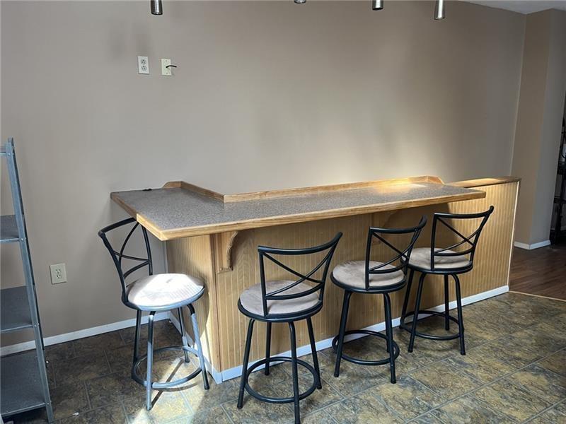 2515 Mt Troy Road Pittsburgh, PA 15212 - Photo 8 of 27 a table and chairs in a room