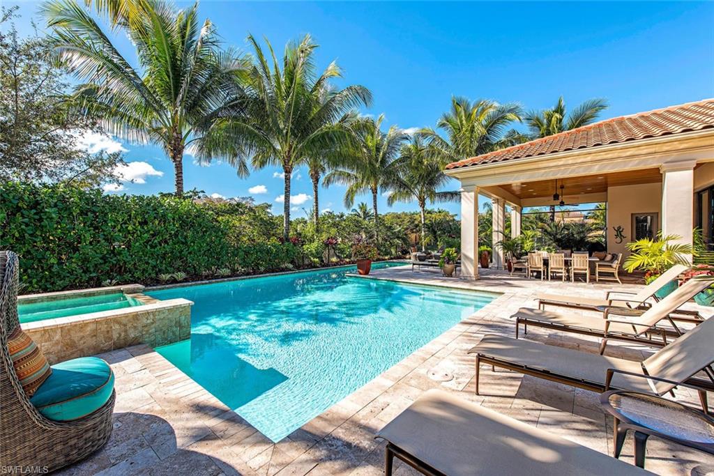 2178 Miramonte Way Naples, FL 34105 - Photo 20 of 21 a view of a backyard with plants and a patio