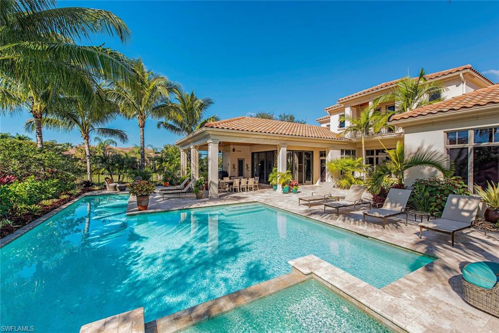 2178 Miramonte Way Naples, FL 34105 - Photo 21 of 21 a view of a house with swimming pool and sitting area
