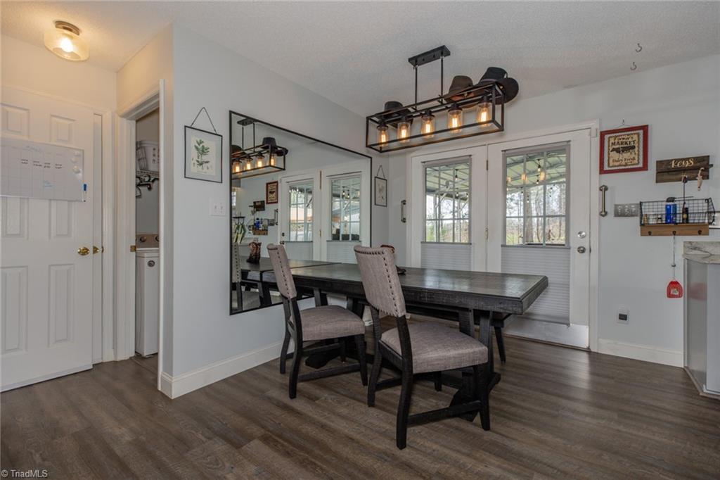 4243 Hunters Run Trinity, NC 27370 - Photo 12 of 33 Natural lighting enhances the dining area