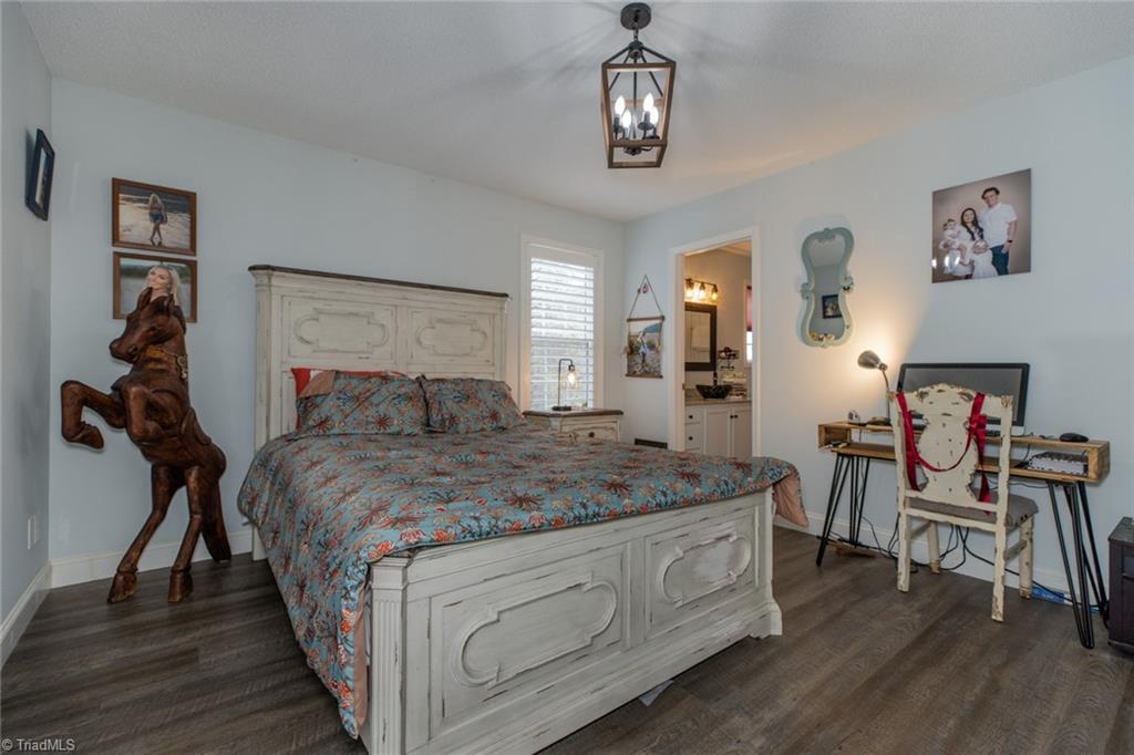 4243 Hunters Run Trinity, NC 27370 - Photo 19 of 33 Primary bedroom on main floor