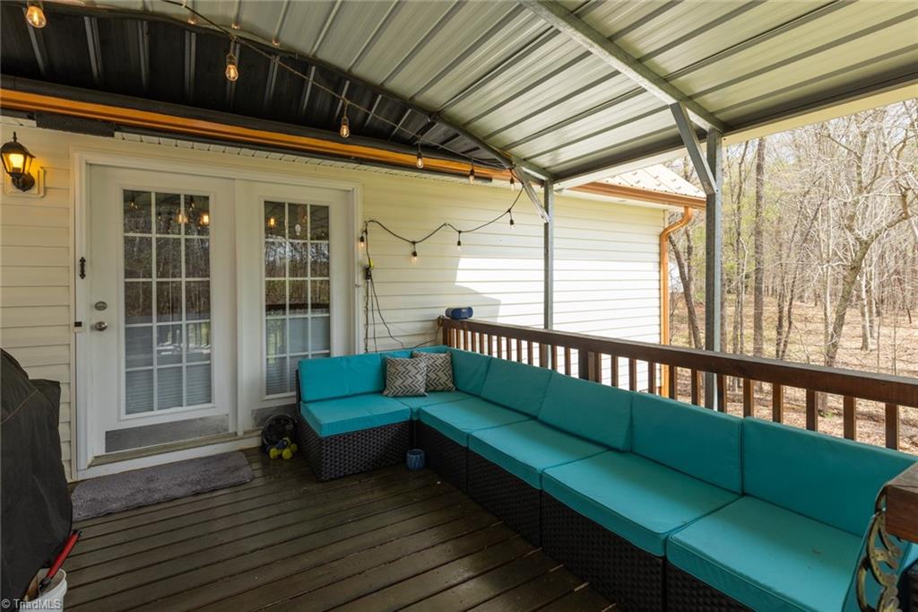 4243 Hunters Run Trinity, NC 27370 - Photo 7 of 33 french doors open to kitchen