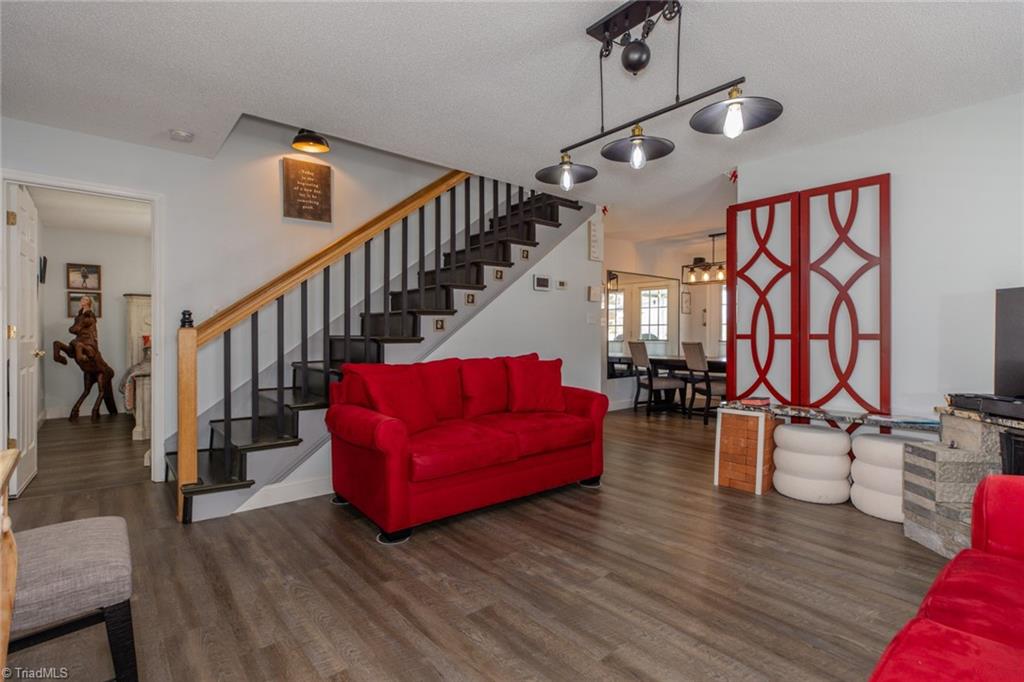 4243 Hunters Run Trinity, NC 27370 - Photo 9 of 33 living room with views to primary bedroom and dining