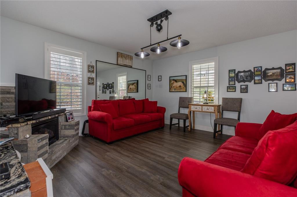 4243 Hunters Run Trinity, NC 27370 - Photo 10 of 33 fireplace added by seller is a free standing surrounded by stone