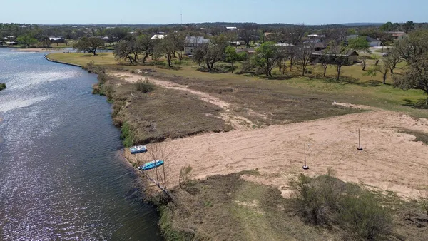 a view of a road with view of a town