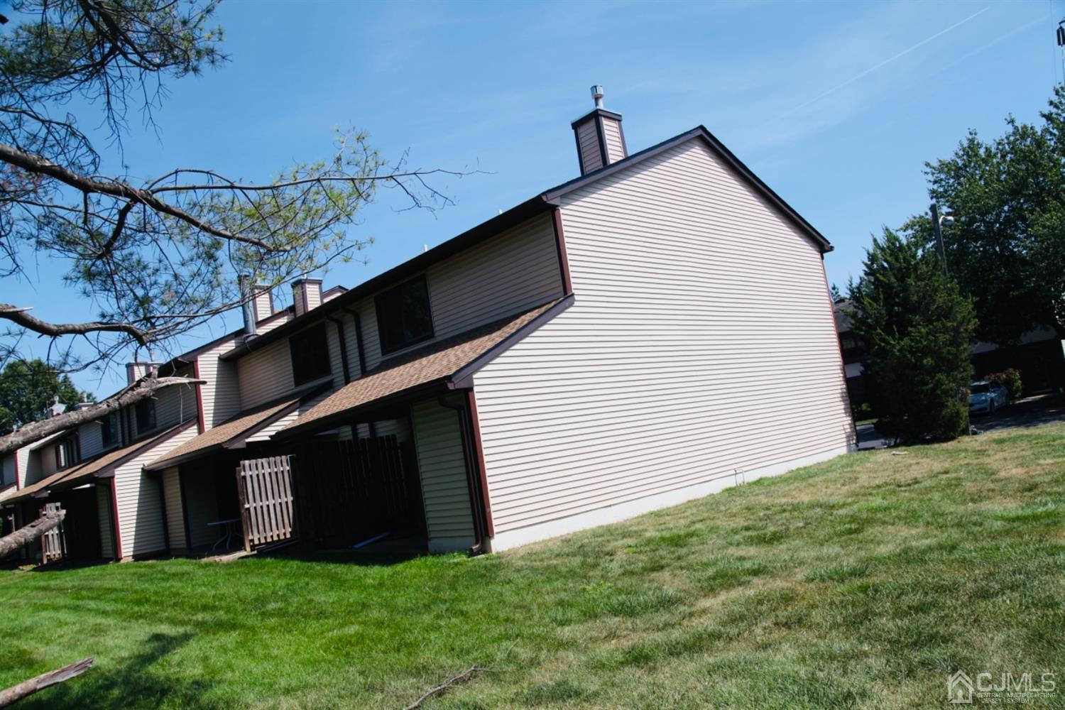 8401 Hana Road Edison, NJ 08817 - Photo 2 of 41 a view of a house with a yard