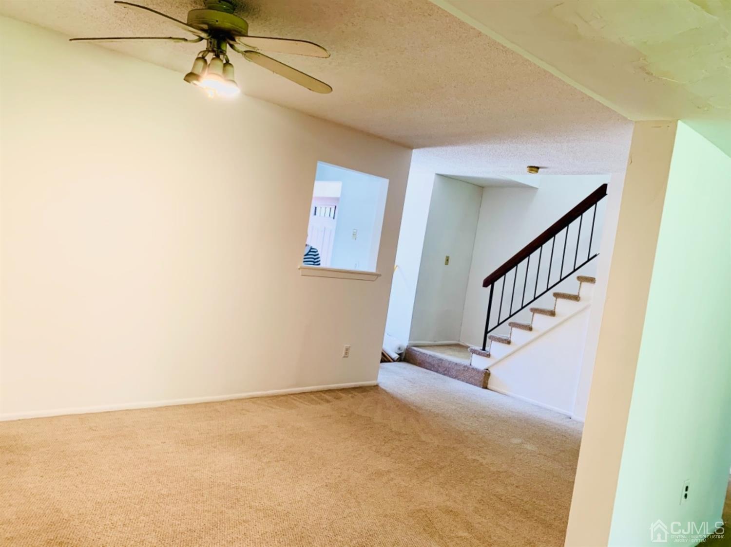 8401 Hana Road Edison, NJ 08817 - Photo 14 of 41 a view of entryway and hall with a window