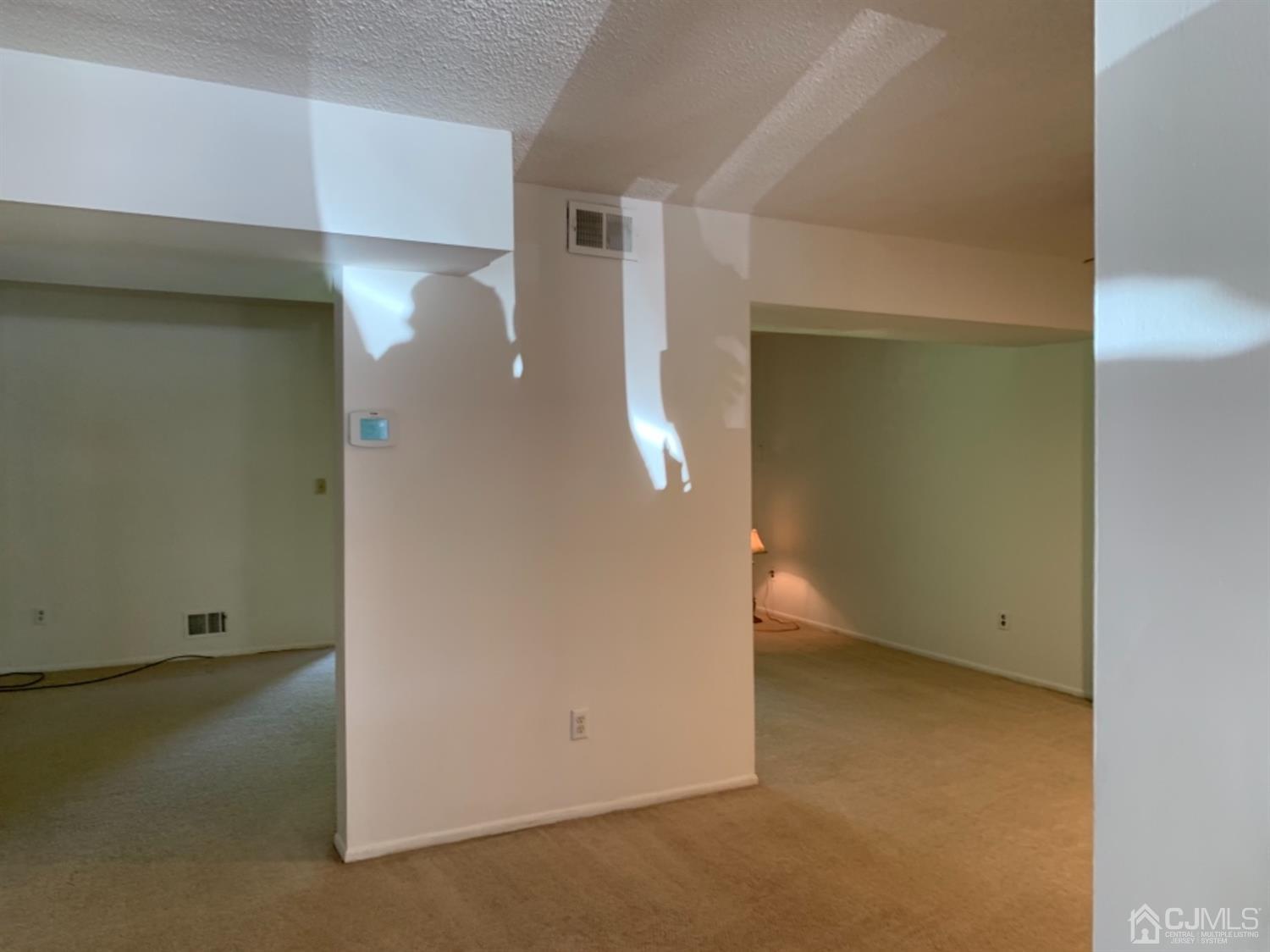 8401 Hana Road Edison, NJ 08817 - Photo 23 of 41 an empty room with windows
