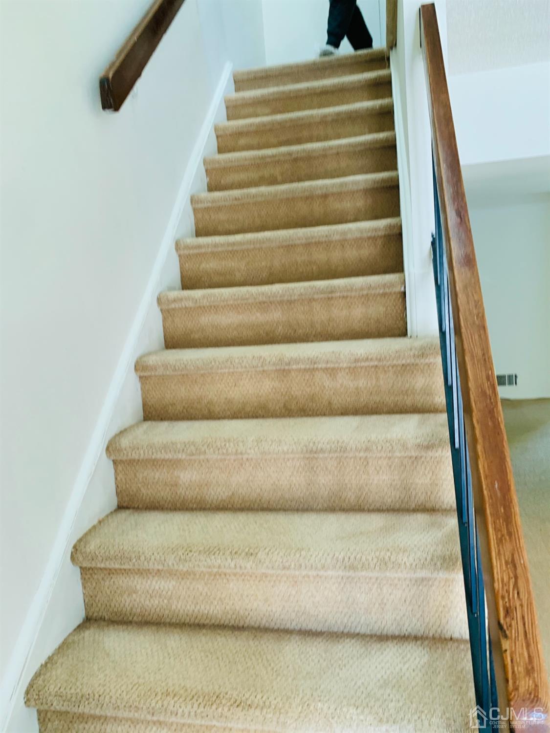 8401 Hana Road Edison, NJ 08817 - Photo 25 of 41 a view of staircase with white walls
