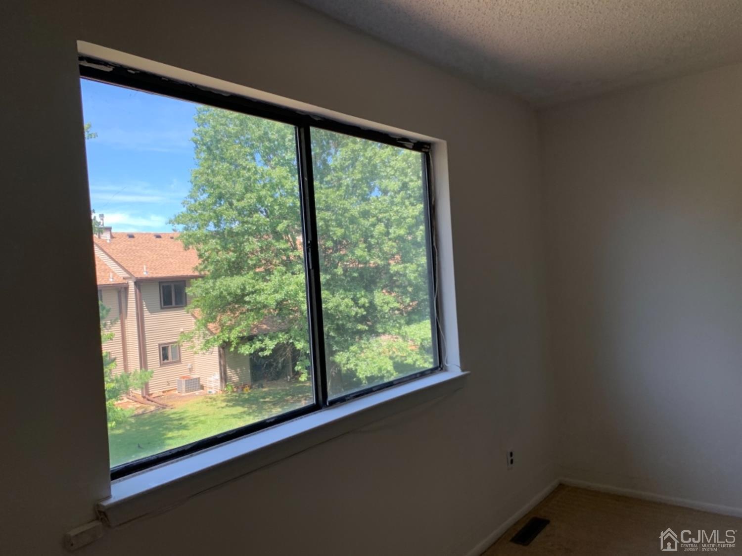 8401 Hana Road Edison, NJ 08817 - Photo 28 of 41 a view of a room with a large window