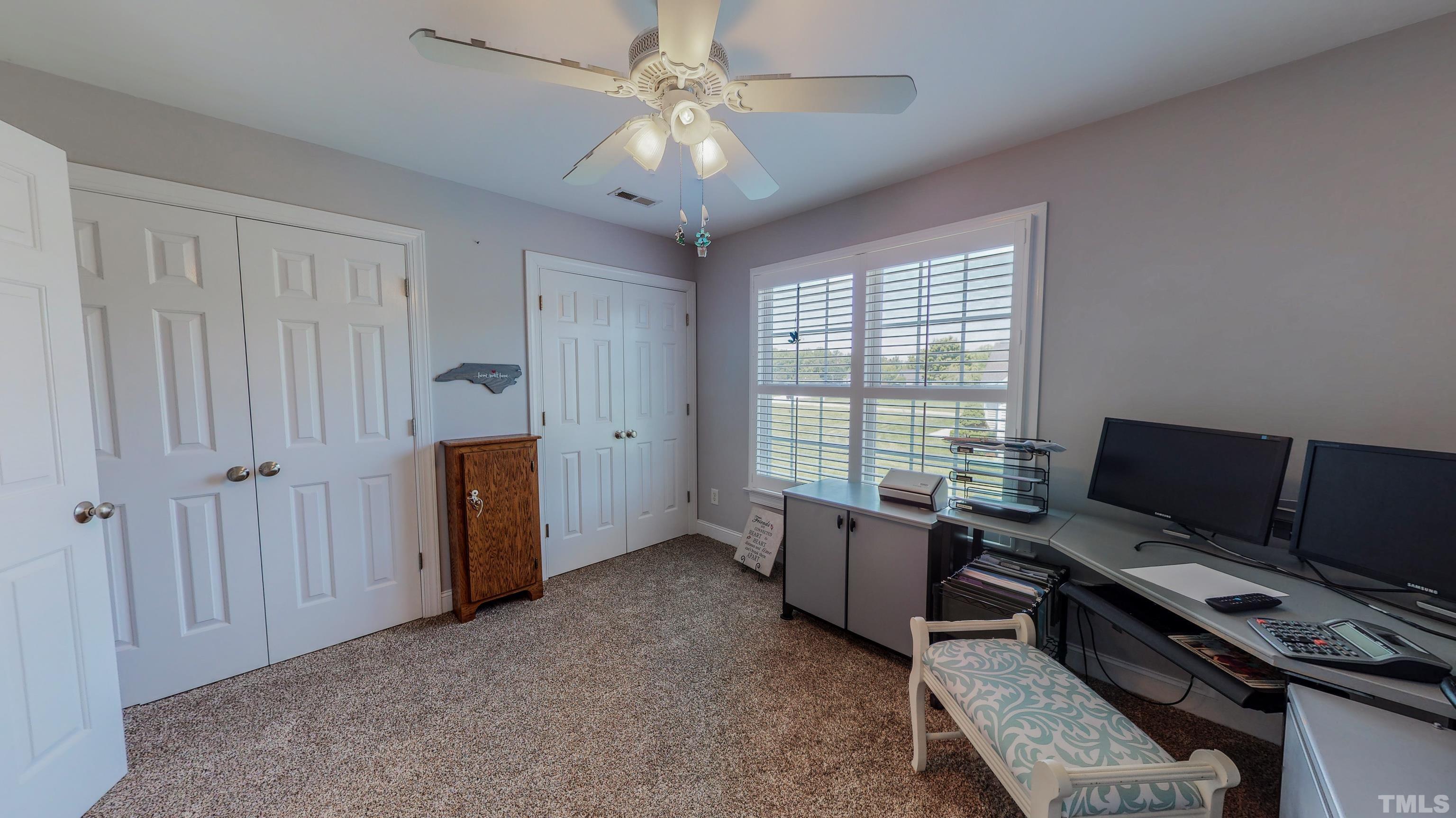 103 Derwin Drive Timberlake, NC 27583 - Photo 32 of 57 a workspace with furniture and a window
