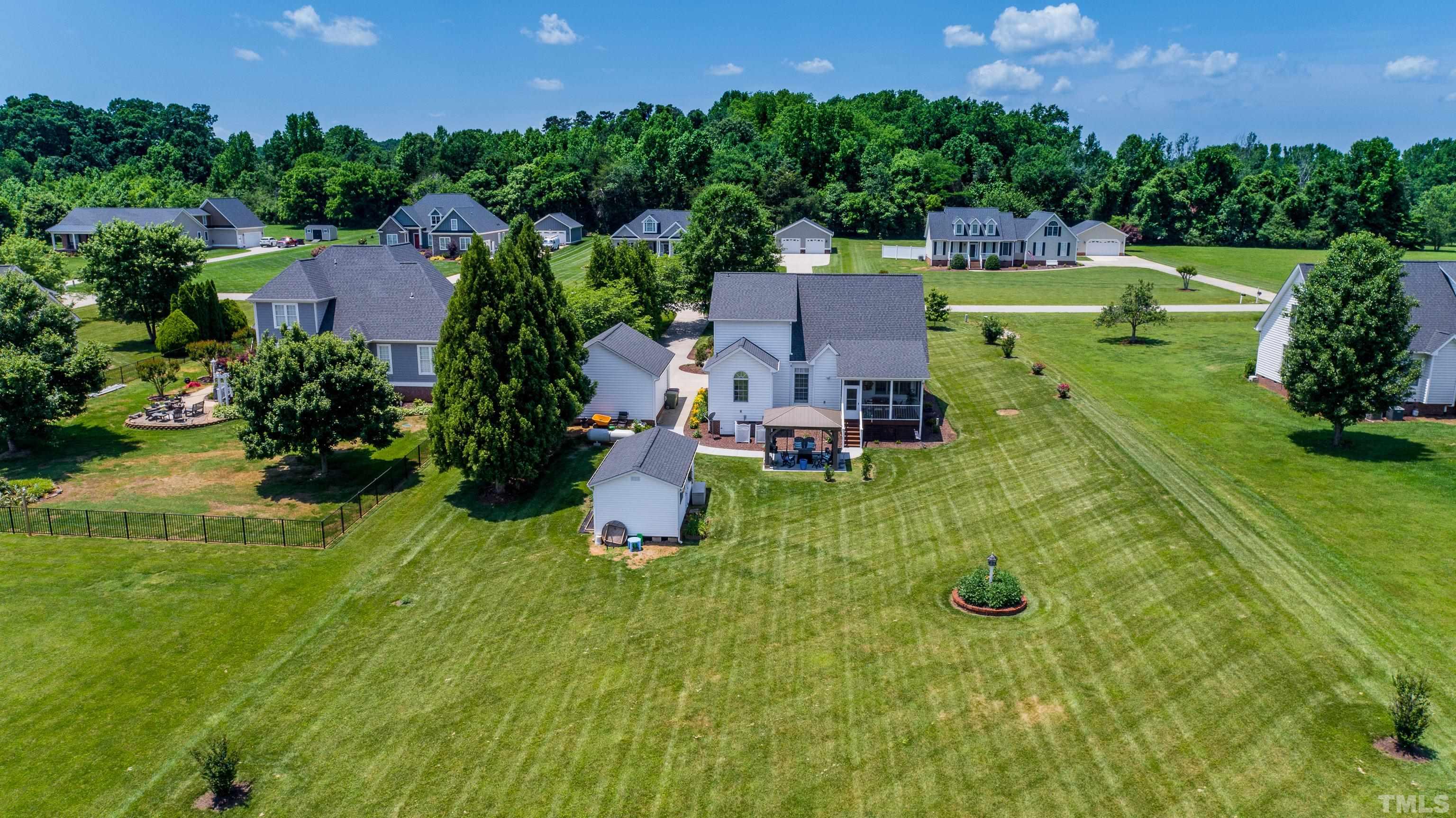 103 Derwin Drive Timberlake, NC 27583 - Photo 45 of 57 an aerial view of a house with yard swimming pool and outdoor seating