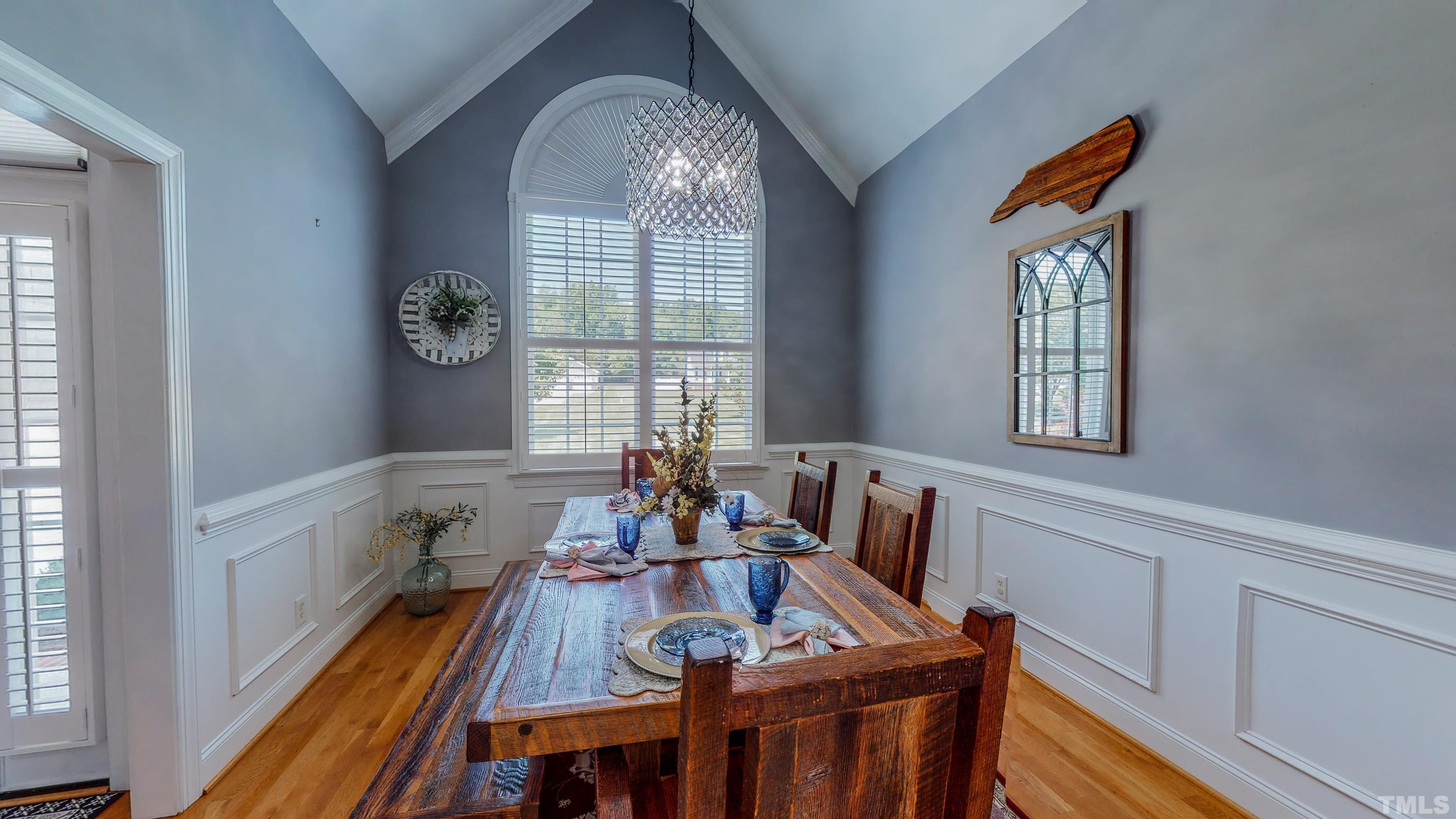 103 Derwin Drive Timberlake, NC 27583 - Photo 6 of 57 a view of a dining room with furniture window and wooden floor