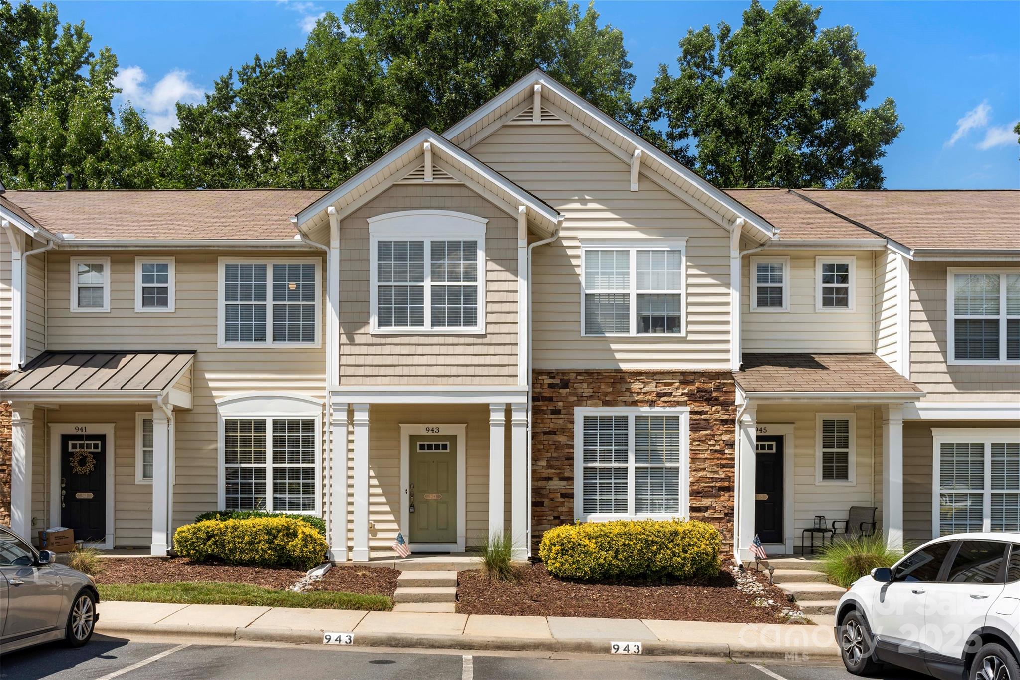 943 Copperstone Lane Fort Mill, SC 29708 - Photo 1 of 37 a front view of a house with a yard and garage