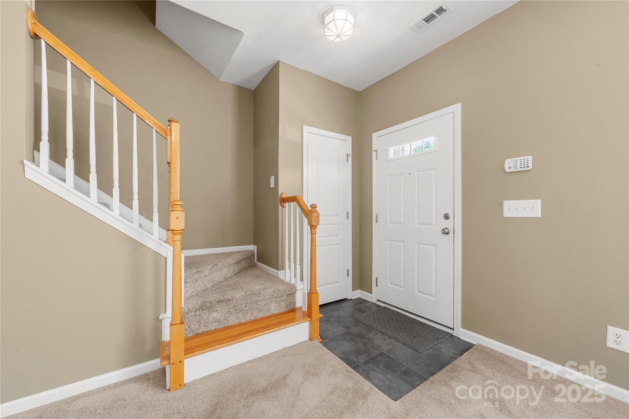 943 Copperstone Lane Fort Mill, SC 29708 - Photo 17 of 37 a view of an entryway with staircase