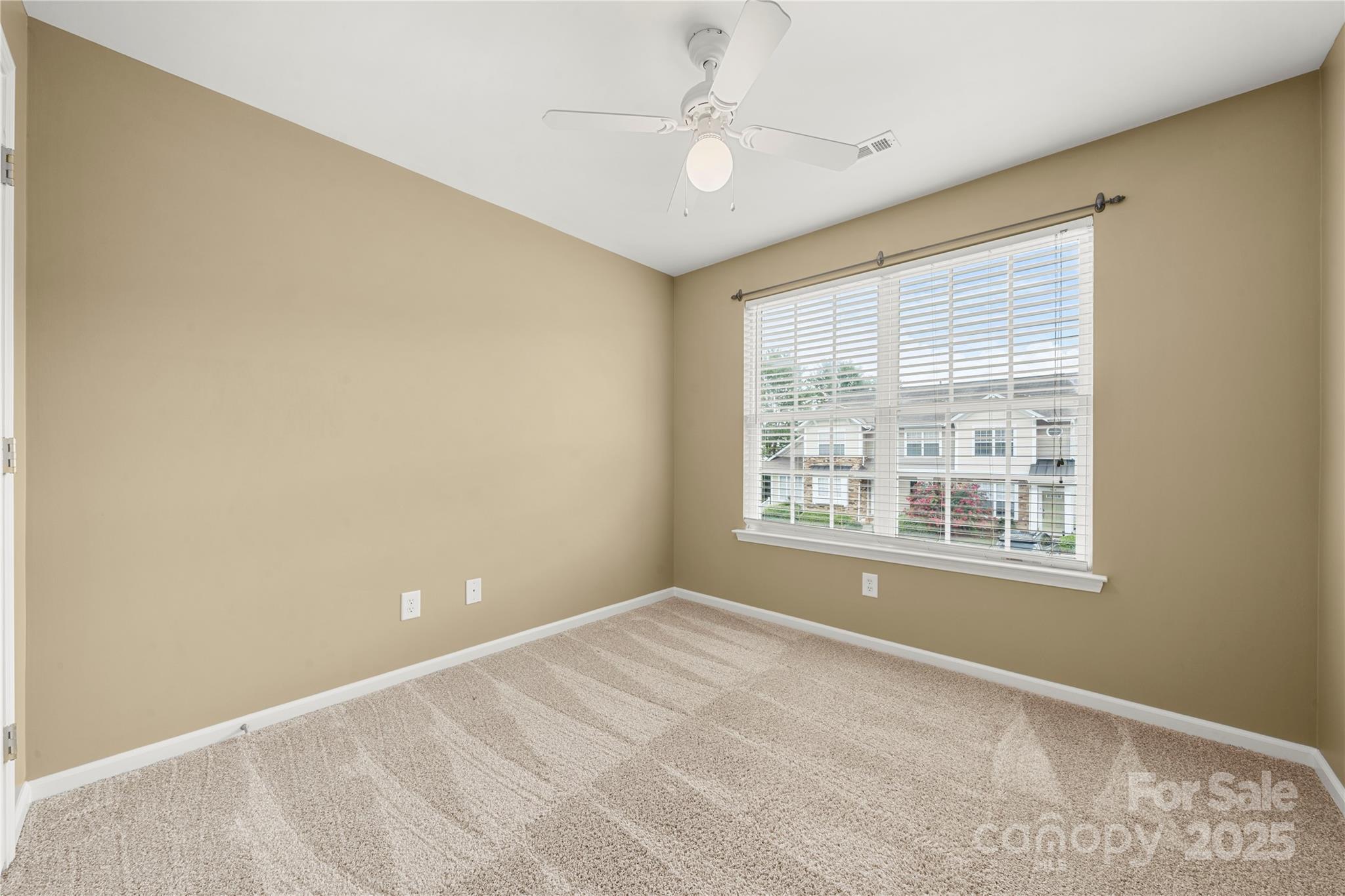 943 Copperstone Lane Fort Mill, SC 29708 - Photo 19 of 37 a view of an empty room with a window
