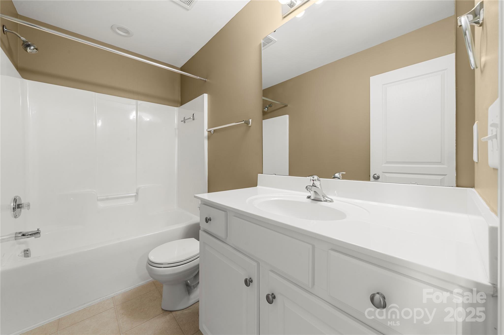 943 Copperstone Lane Fort Mill, SC 29708 - Photo 23 of 37 a bathroom with a sink a toilet and shower