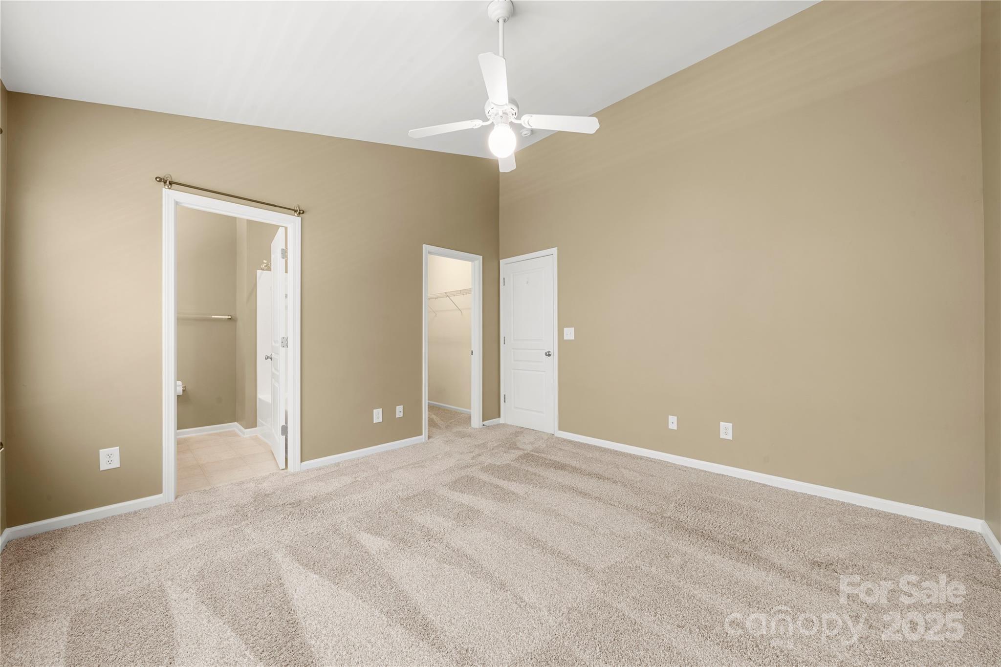 943 Copperstone Lane Fort Mill, SC 29708 - Photo 25 of 37 a view of a room with a chandelier fan and a window