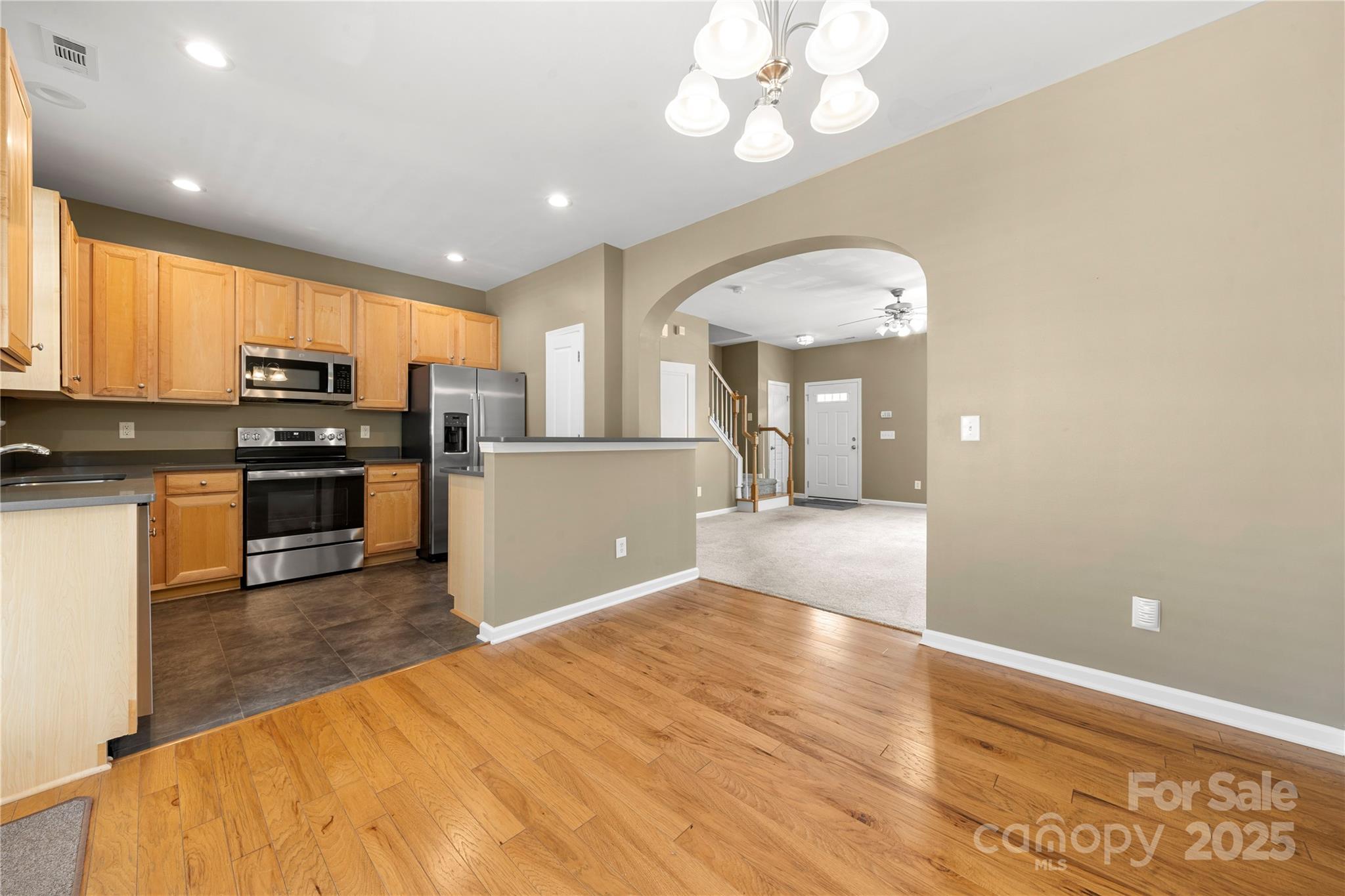 943 Copperstone Lane Fort Mill, SC 29708 - Photo 9 of 37 a view of a kitchen with microwave and cabinets