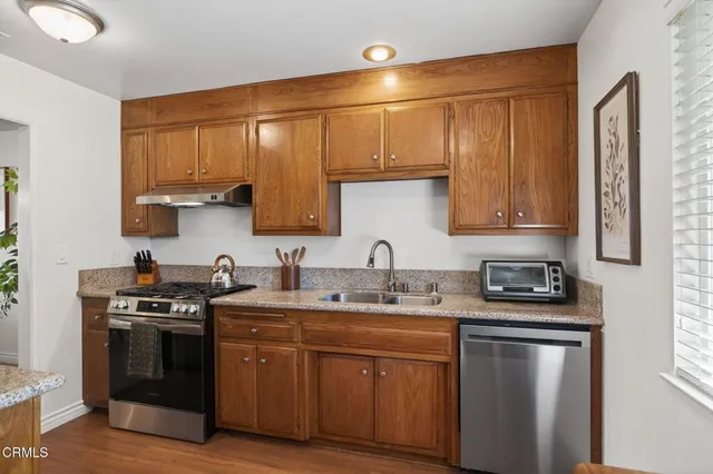 a bathroom with a granite countertop sink