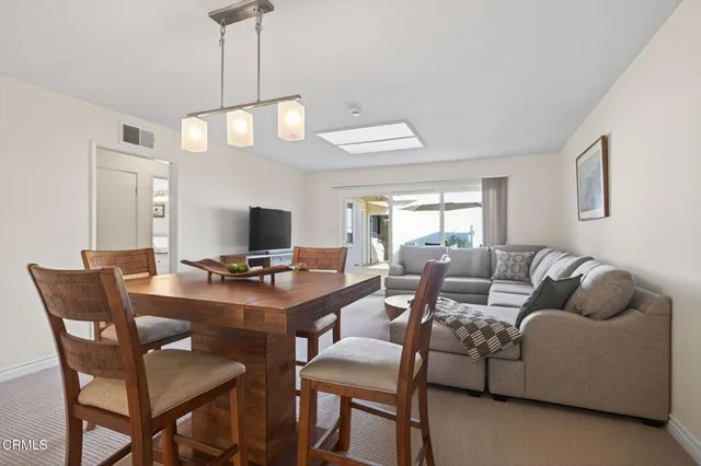 a bedroom with a bed and a table