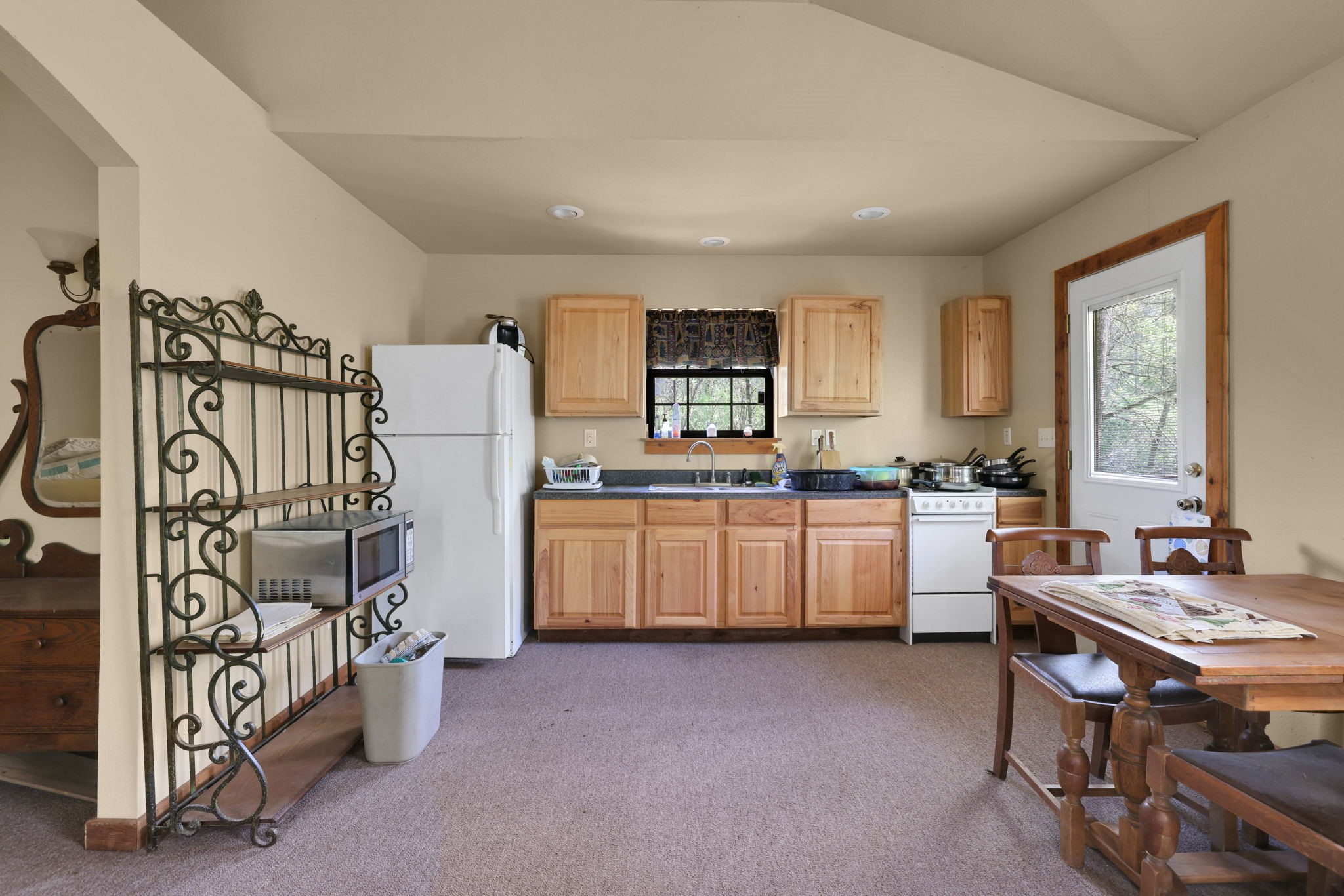 250 Critter Creek Road Coldspring, TX 77331 - Photo 48 of 48 Cabin 4 - kitchen, dining and living open floor plan