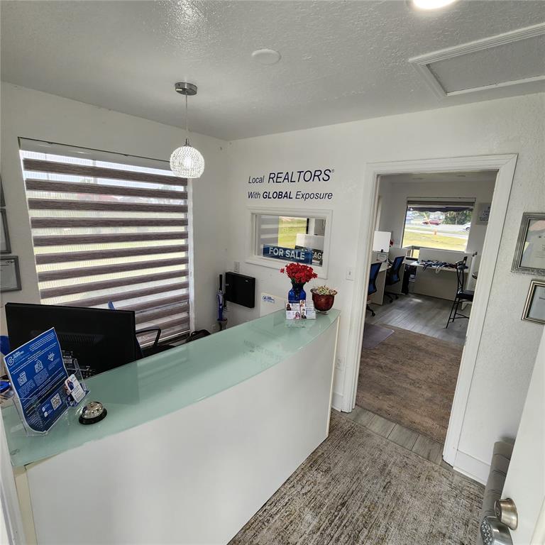 909 Southwest Sw Highway Ocala, FL 34471 - Photo 5 of 19 a living room with furniture and a flat screen tv