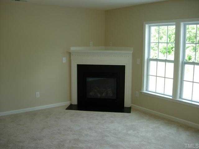 1300 Rushing Creek Parkway Raleigh, NC 27610 - Photo 2 of 12 Direct Vent Gas Fireplace in Family Room with Triple Windows
