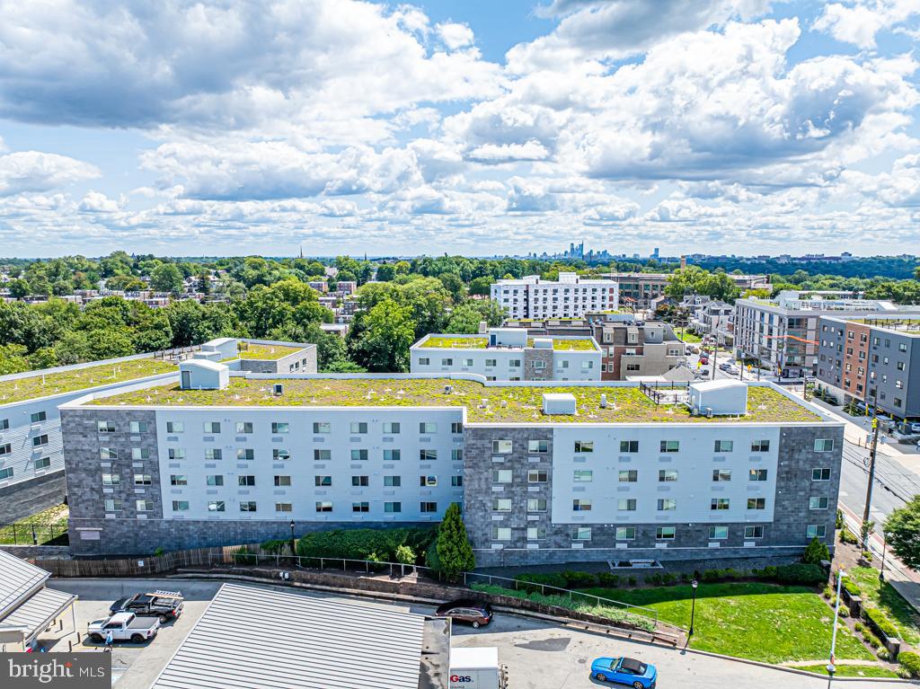 6649 Ridge Avenue, Unit B201 Philadelphia, PA 19128 - Photo 12 of 12 a view of a balcony with wooden floor