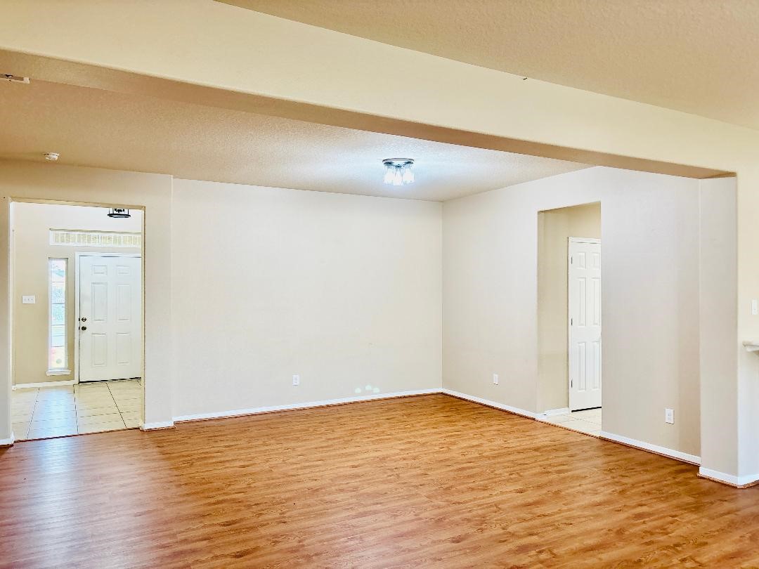 9947 Valance Way Conroe, TX 77385 - Photo 12 of 48 a view of an empty room
