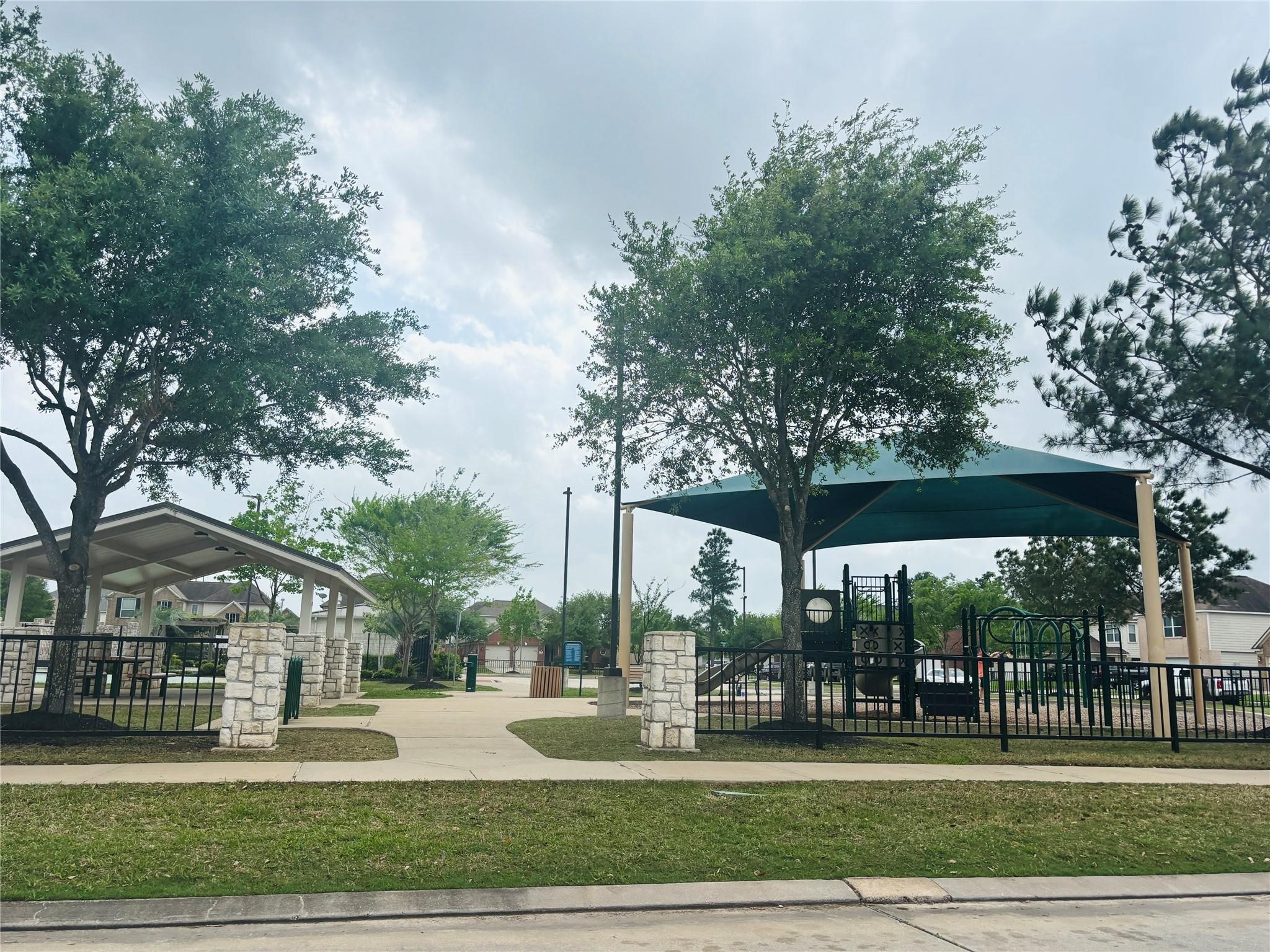 9947 Valance Way Conroe, TX 77385 - Photo 47 of 48 a view of a park with large trees