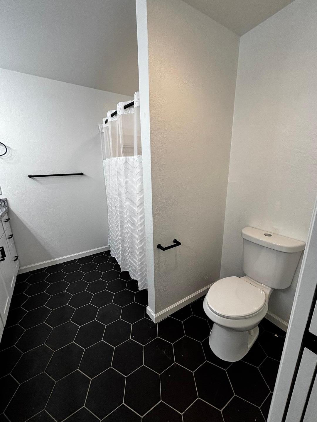 3030 North Hayden Road, Unit 16 Scottsdale, AZ 85251 - Photo 22 of 30 a bathroom with a toilet and a shower