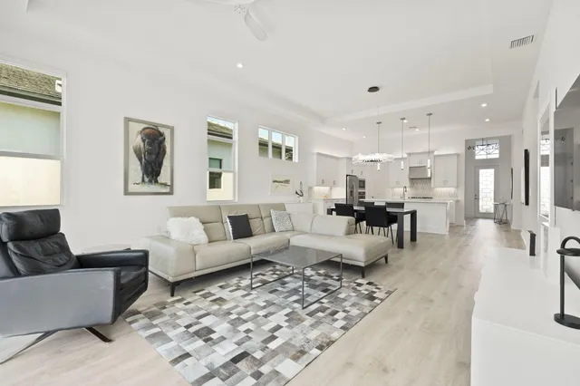 a living room with furniture and a view of living room