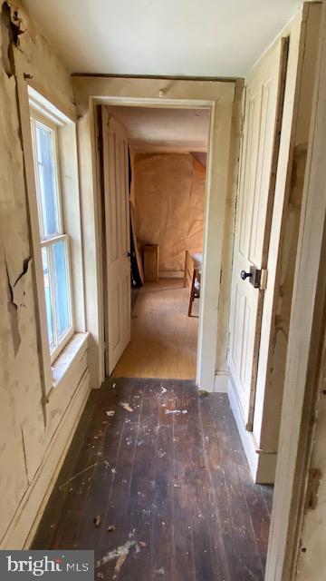 201 Hoover Road Robertsdale, PA 16674 - Photo 25 of 55 a view of a hallway with wooden floor and furniture