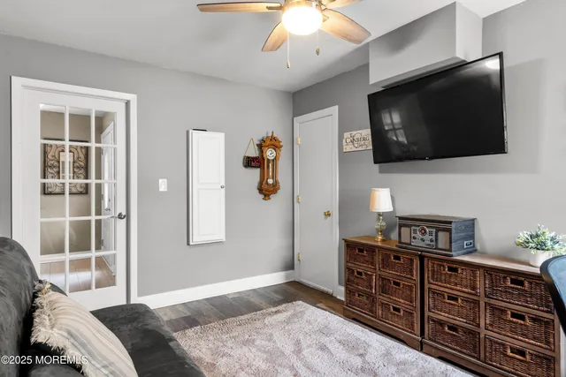 a view of a patio with table and chairs and potted plants