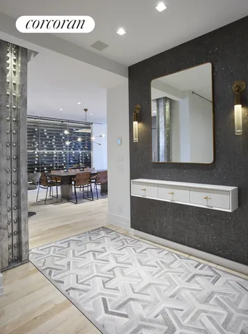 a bathroom with a sink a mirror and a shower